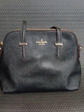 kate spade black dome satchel with gold logo